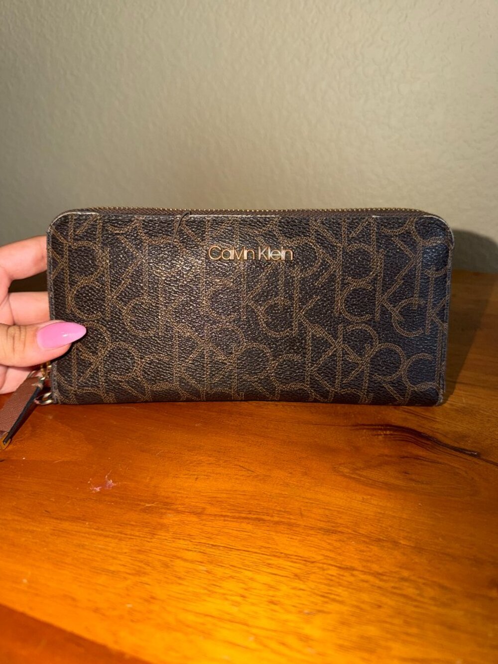 Brown Calvin Klein zip-around wallet